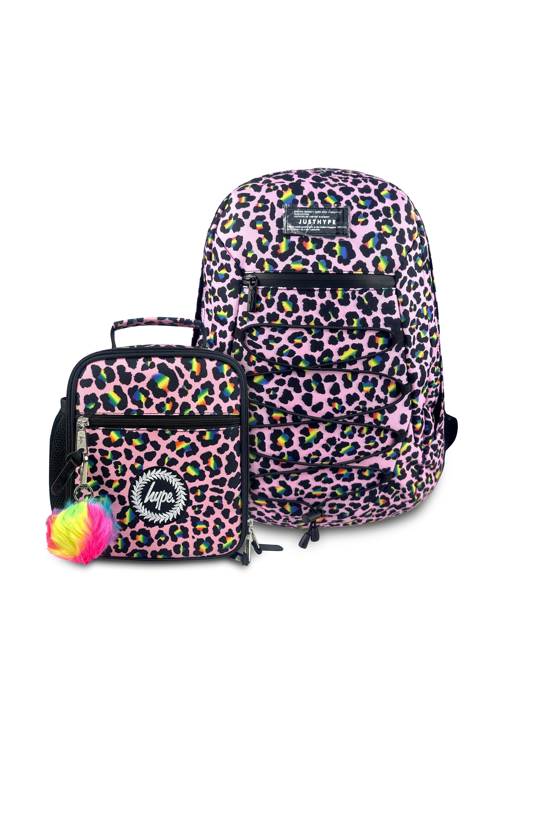 Two leopard print kids backpacks with a small pom-pom toy on a white background
