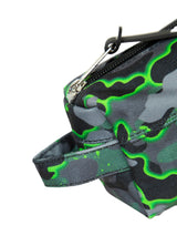 Hype Green Glow Camo pencil case lifestyle shot — school-ready and on-trend