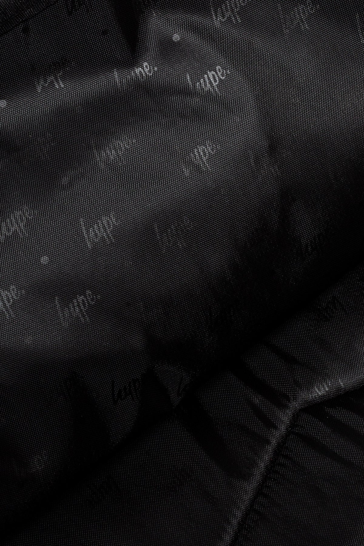 Hype Black & Purple Glitter Scribble Hearts backpack — colour and design detail from above
