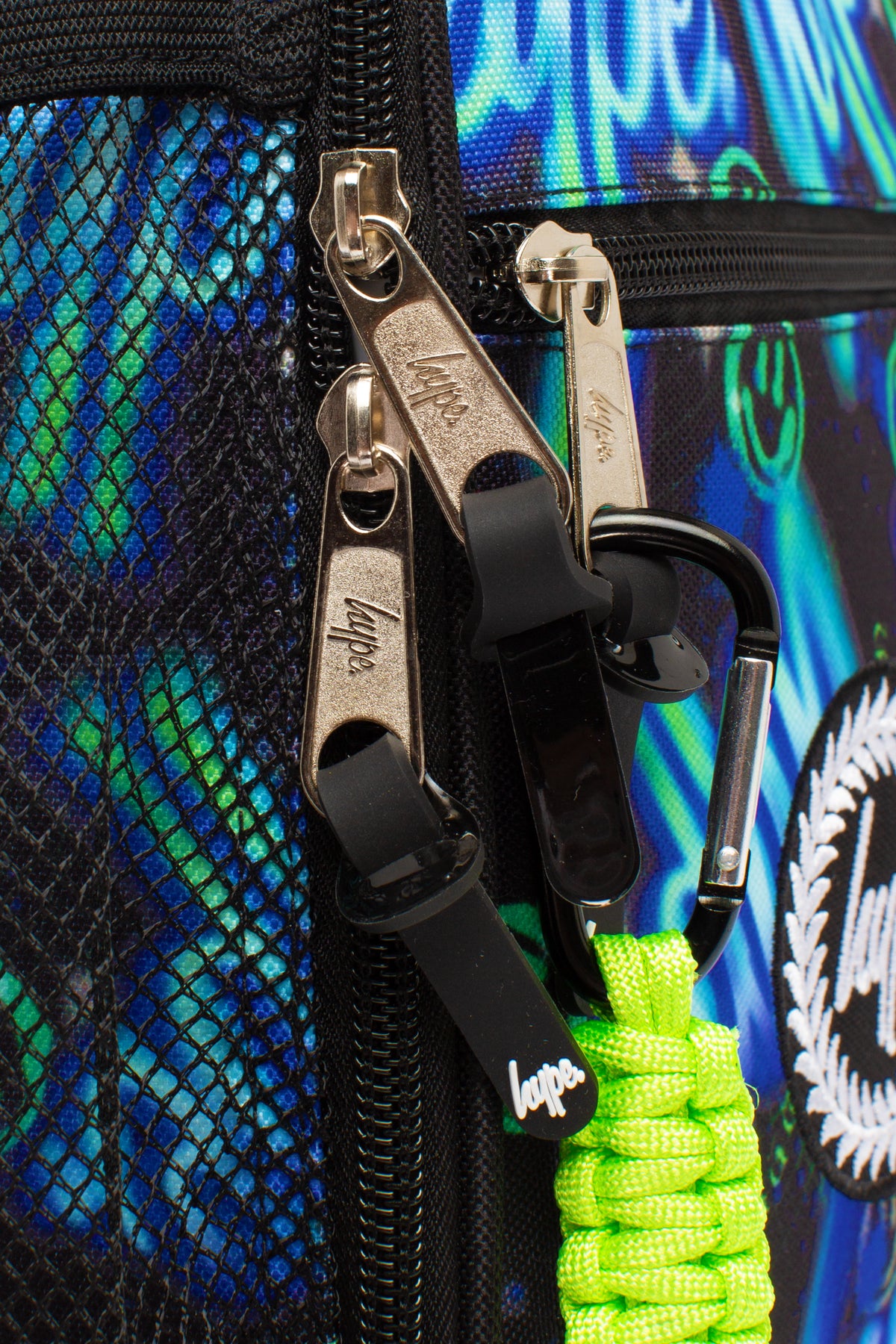 Hype Blue & Green Electric Smile insulated lunch bag — close-up of logo and design details