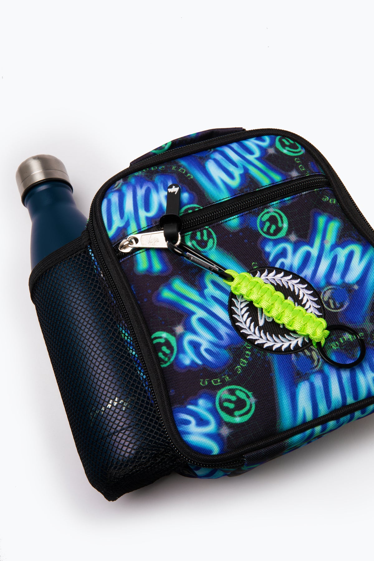 Hype Blue & Green Electric Smile insulated lunch bag — colour and design detail from above