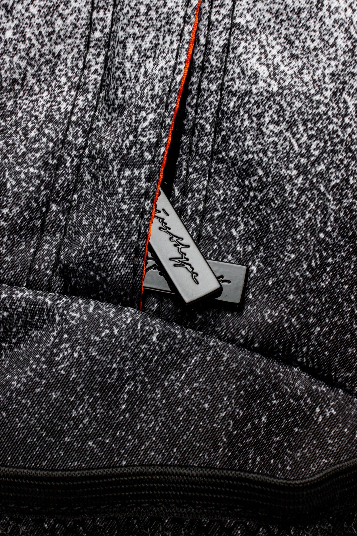 Hype Black & White Speckle Fade backpack — colour and design detail from above
