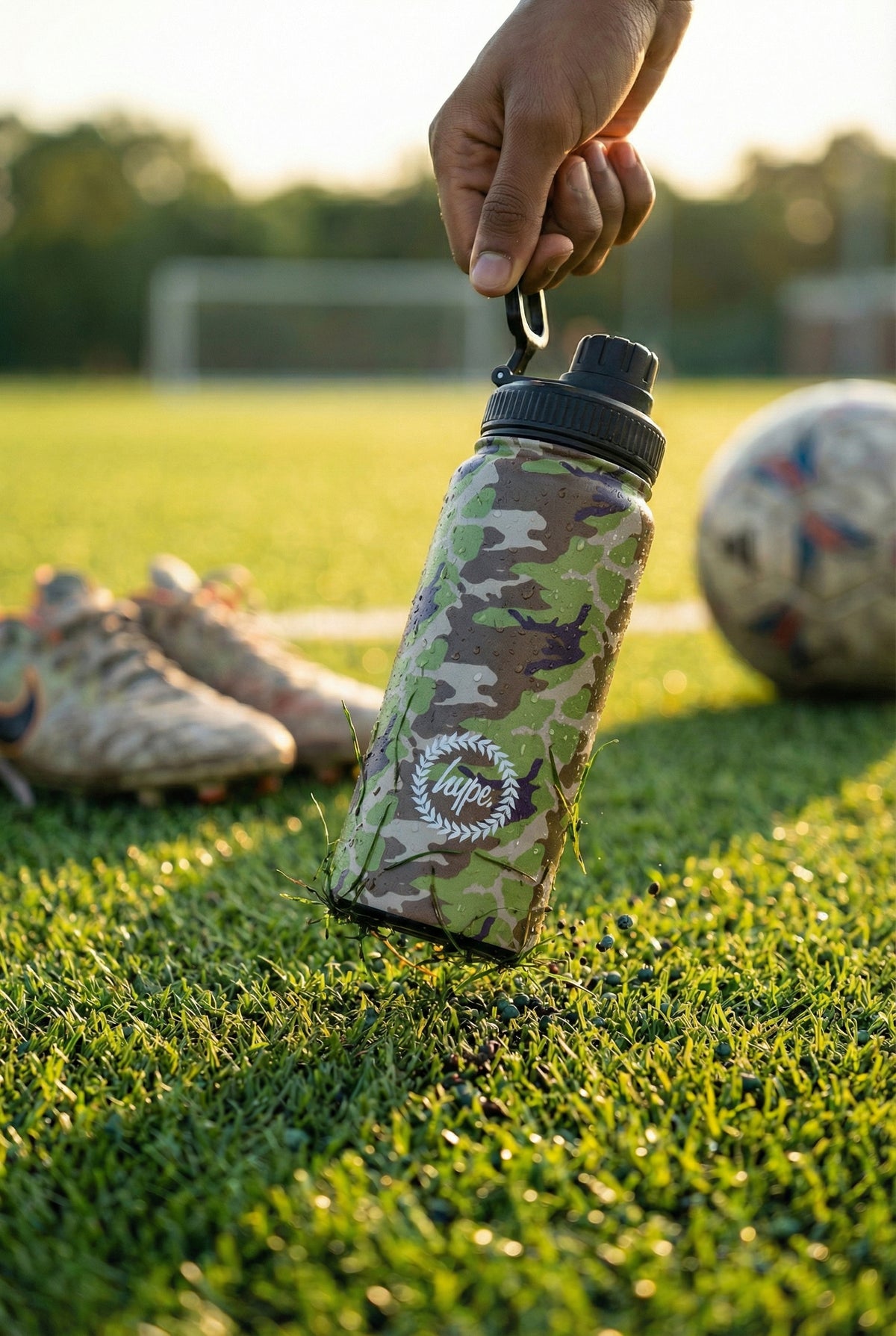 Hype Camo Crest bottle with lid open — easy-pour spout and clean finish